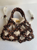 Bassmera Noisette handcrafted beaded bag in chocolate brown, bronze and beige acrylic marble beads

