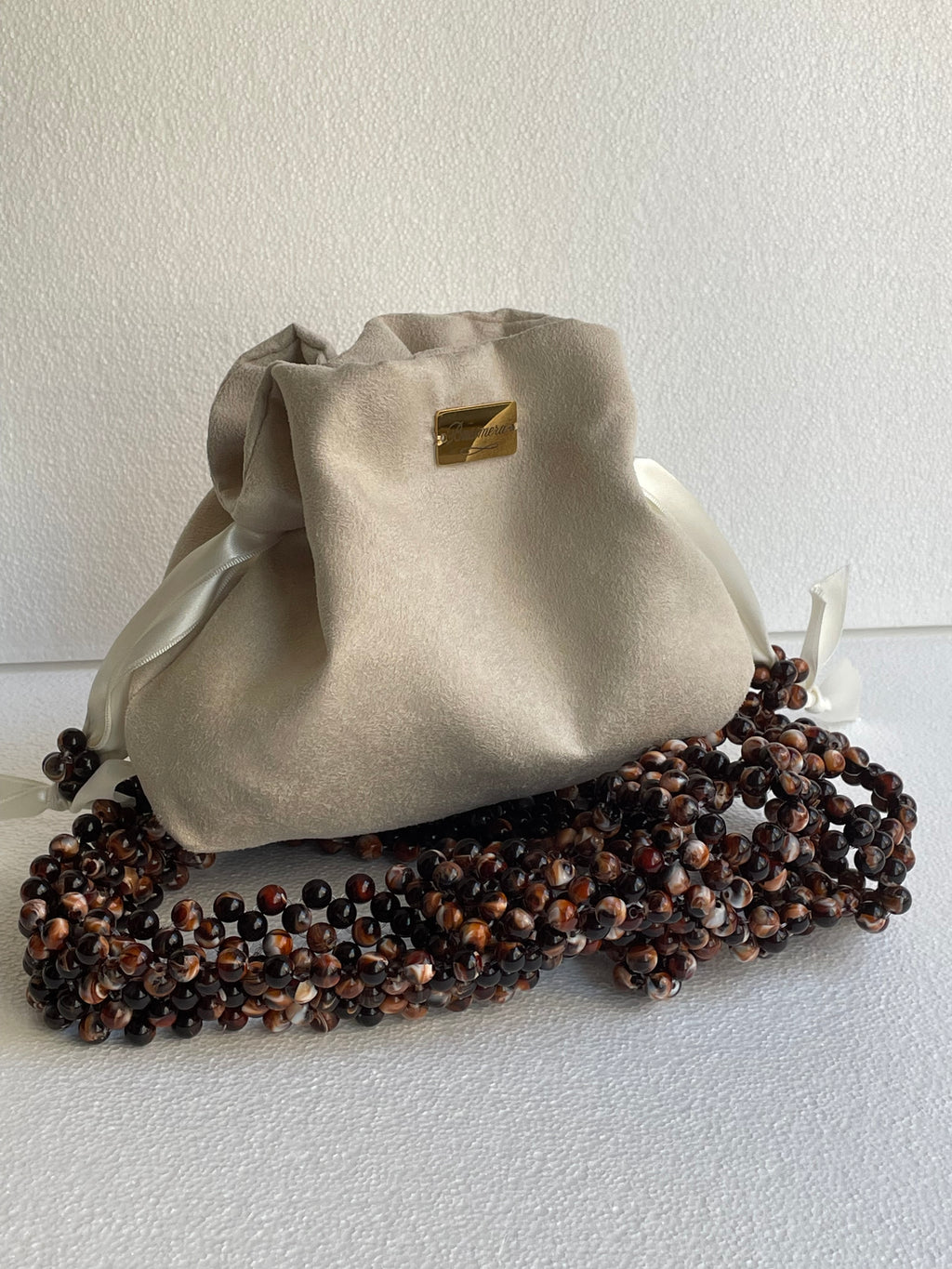  Noisette luxury handbag – soft suede inner pouch and structured beaded exterior