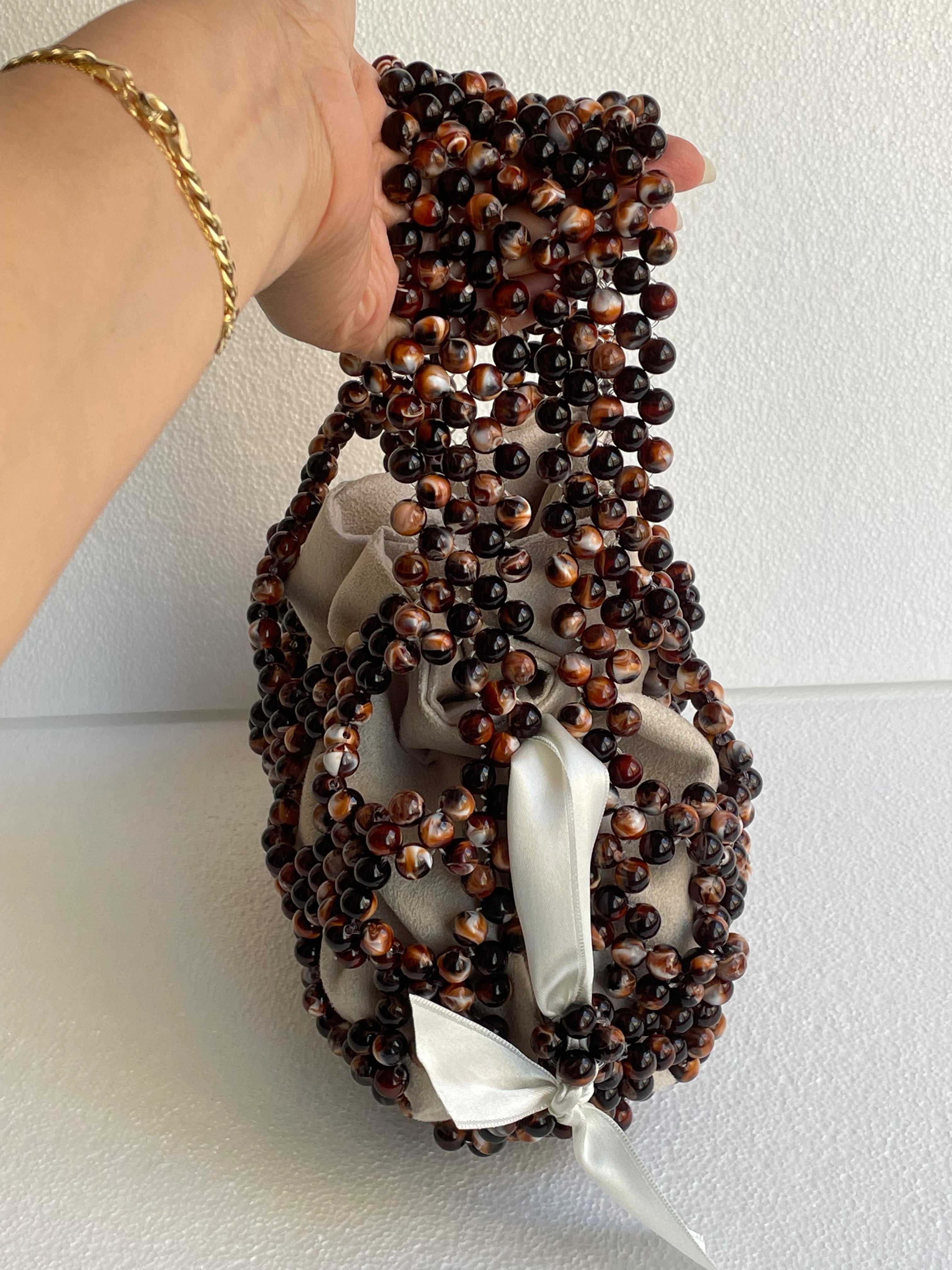  Bassmera Noisette beaded handbag side view – satin ribbon closure and beaded handles